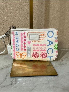 Coach Poppy Wristlet White Coated Canvas With Colorful Floral & Butterfly Print